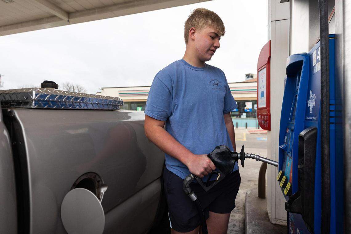 Ian Bothwell pumps gas in Fort Worth on March 14, when after prices hit a record high before dropping slightly. Now gas prices are surging once again.