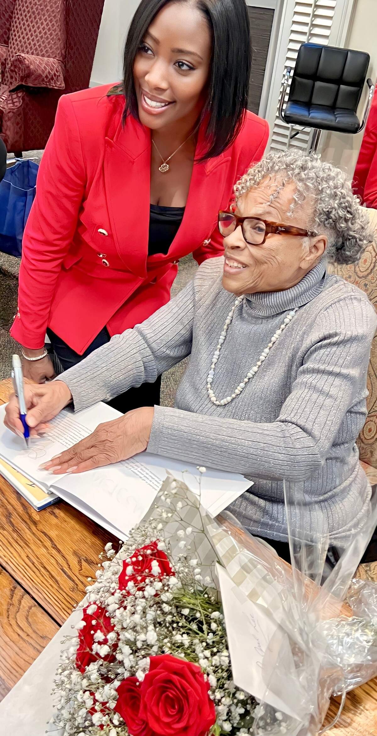 Opal Lee signed her book “Juneteenth: A Children’s Story” for Jessica Smith at a retired teachers’ luncheon March 14, 2023, at Broadway Baptist Church in Fort Worth.