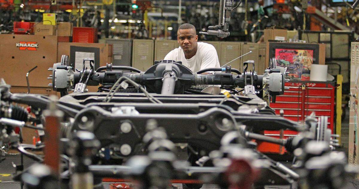 June 12, 2012: Workers on the assembly line at GM Arlington Assembly.