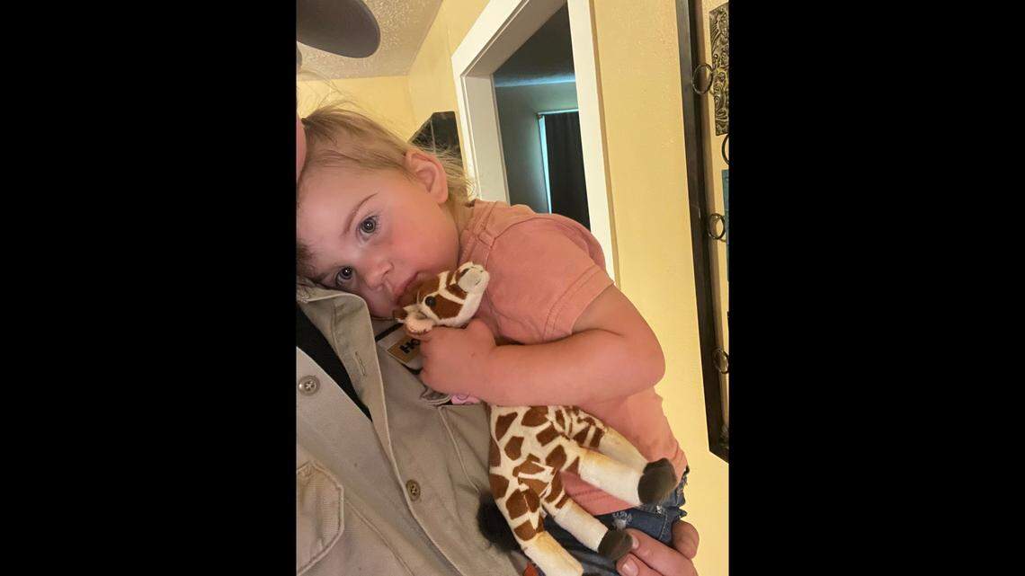 Paisley’s parents bought her a toy giraffe at the gift shop.