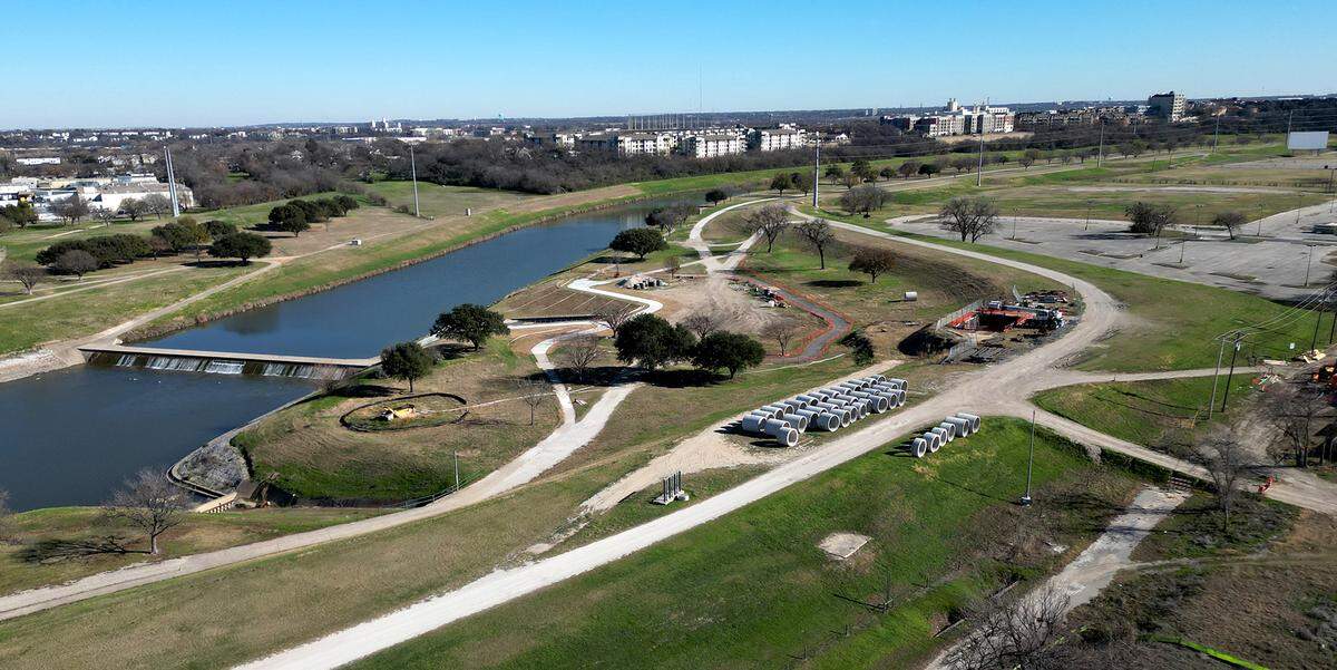 The levee along the West Fork of the Trinity River near the Main Street Bridge on Tuesday, Dec. 30, 2025.