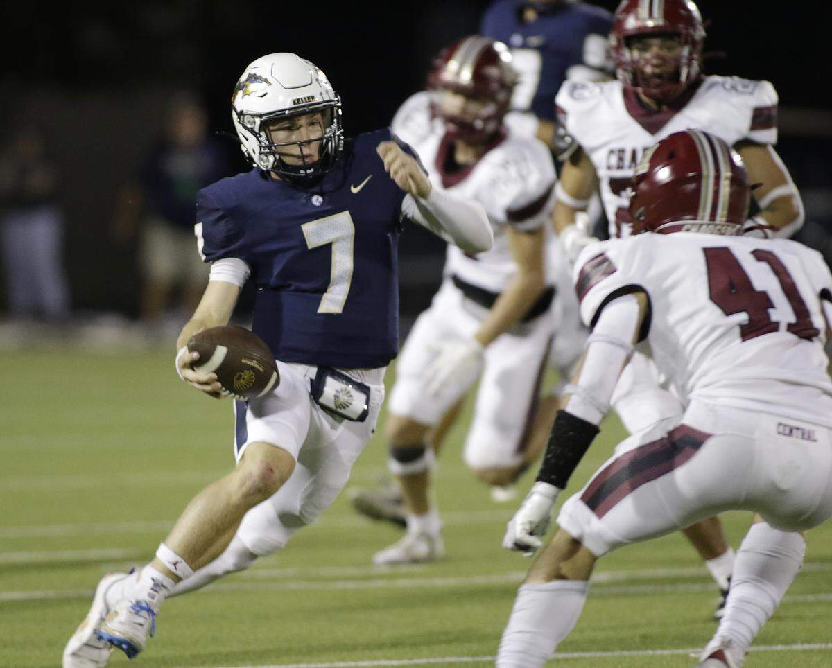 Keller’s Brock Burkett (7) cuts back to pick up yardage against Keller Central during their game at Keller ISD Athletic Complex on Friday, Sep. 26, 2025.