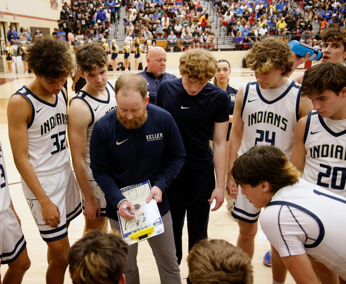 Keller head coach Zachary Weir draws up a play with just minutes remaining during the fourth period of the Conference 6A Region 1 quarterfinals basketball playoffs at Saginaw High School in Saginaw, Texas, Tuesday, Feb. 27, 2024.