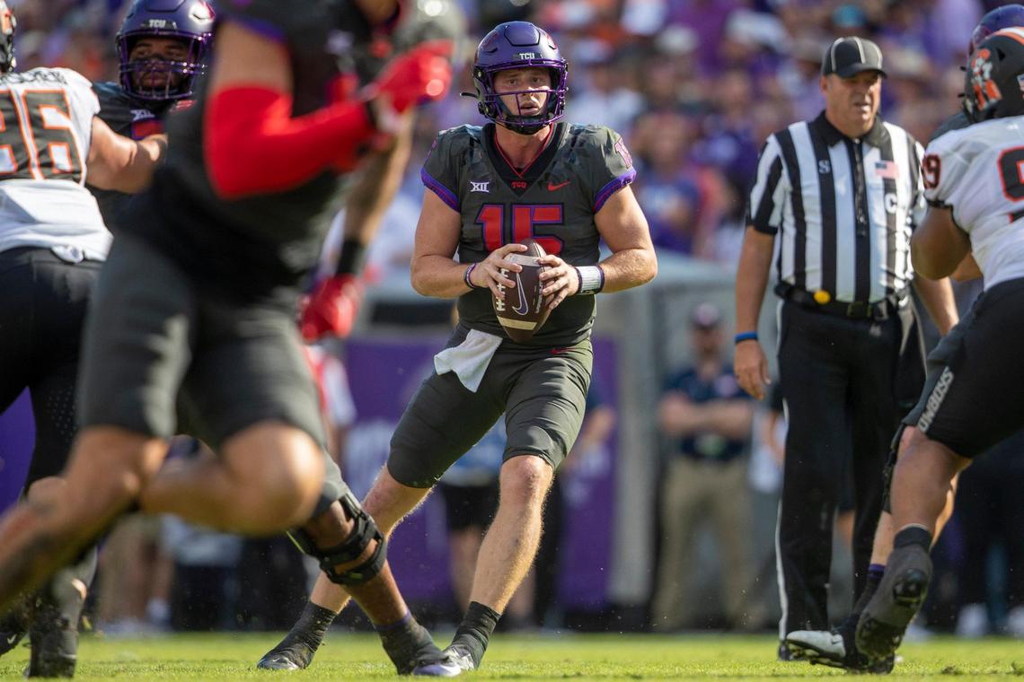 TCU quarterback Max Duggan looks to pass during their game against OSU at the Amon G. Carter Stadium in Fort Worth on Saturday, Oct. 15, 2022.