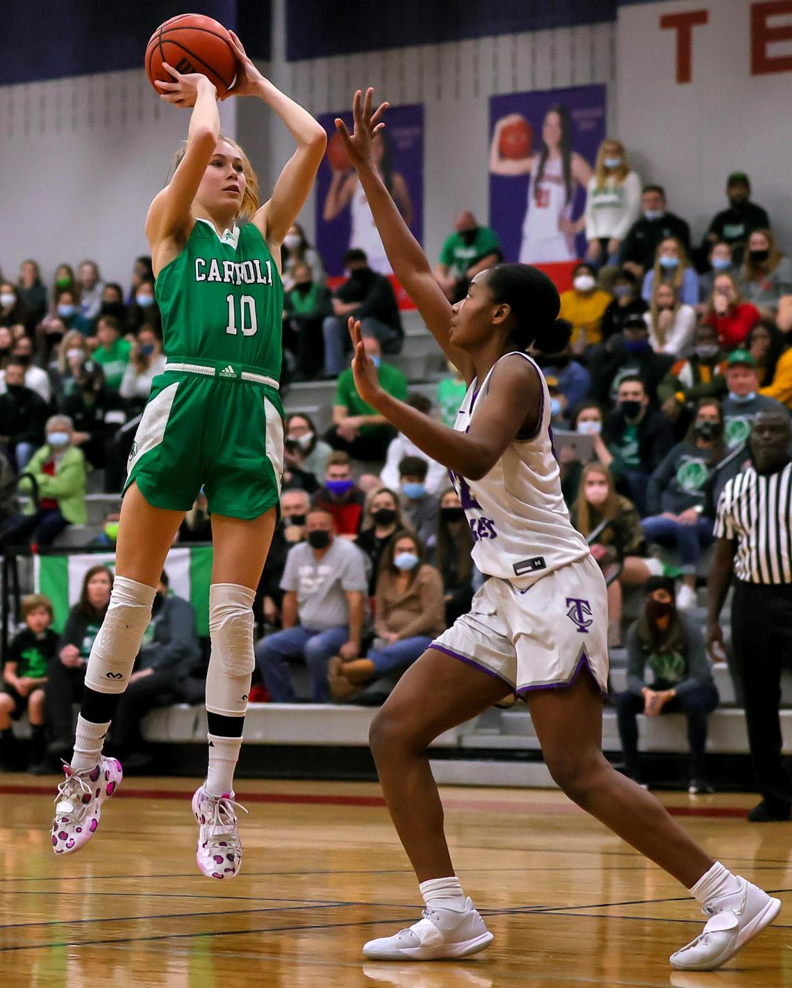 Southlake Carroll guard Kelsey Boyette (10) shoots over Keller Timber Creek forward Deja Lumsden (22) during the second half of a 6A Region I Regional Quarter-Finals Girls Basketball playoff game played on Thursday, February 25, 2021 at Justin Northwest High School. (Steve Nurenberg Special to the Star-Telegram)