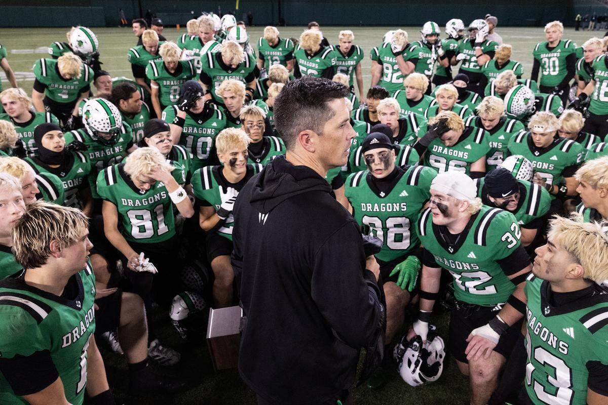 Southlake Carroll Head Coach Riley Dodge speaks to his team after winning the UIL Division II Regional playoff game 49-31 against Prosper at Choctaw Stadium in Arlington on Friday, Nov. 28, 2025.