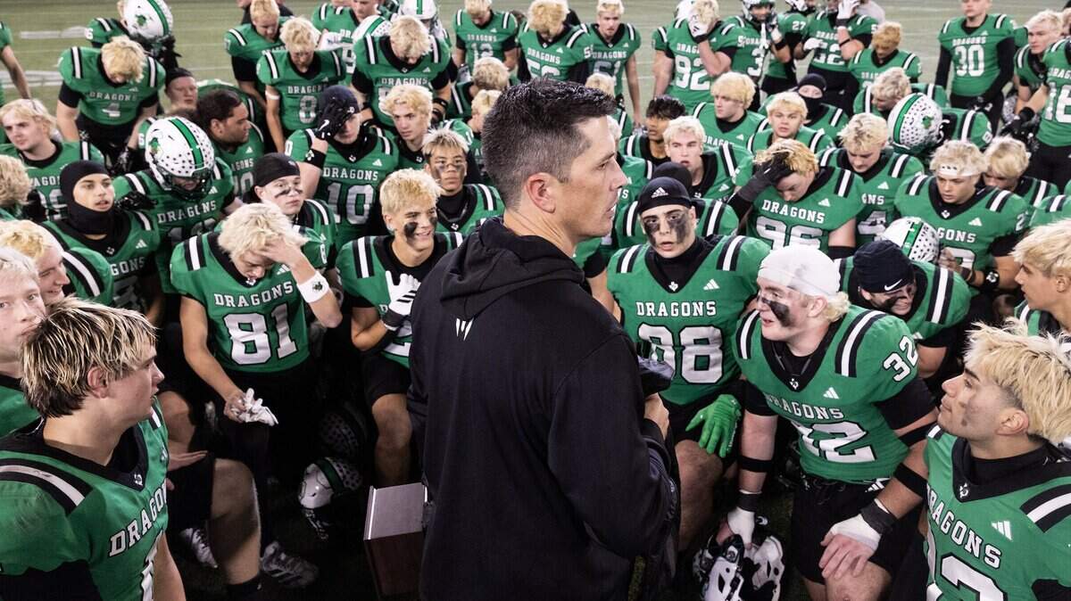 Southlake Carroll Head Coach Riley Dodge speaks to his team after winning the UIL Division II Regional playoff game 49-31 against Prosper at Choctaw Stadium in Arlington on Friday, Nov. 28, 2025.