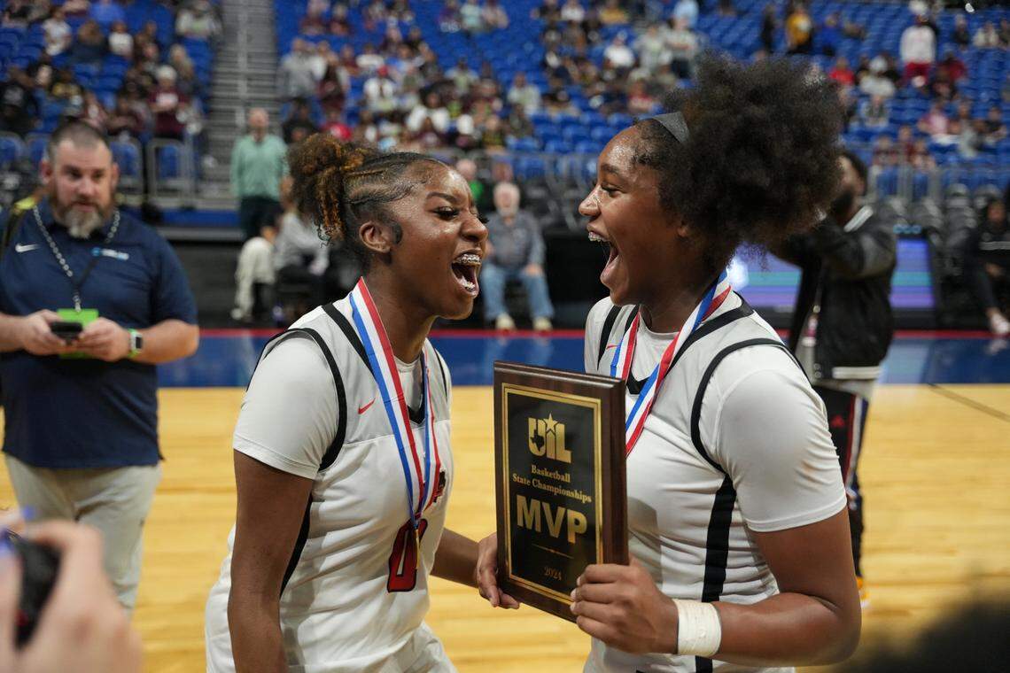 Frisco Liberty’s Aziyah Farrier (left) and Jacy Abii (right) are all smiles after winning the Class 5A state championship game over Mansfield Timberview on Saturday, March 2, 2024 at the Alamodome in San Antonio, Texas. Liberty defeated Timberview 60-51.