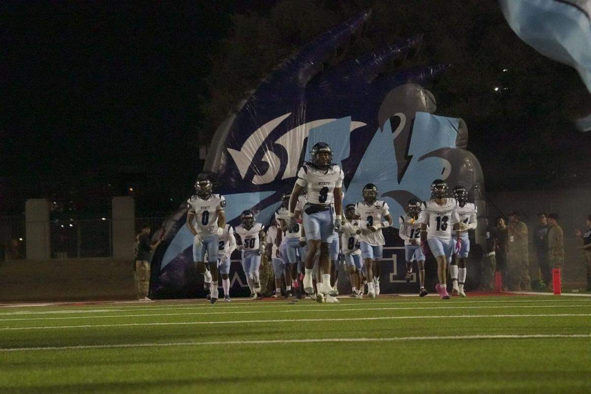Fort Worth O.D. Wyatt runs onto the field before facing Fort Worth Paschal on Thursday at Farrington Field.