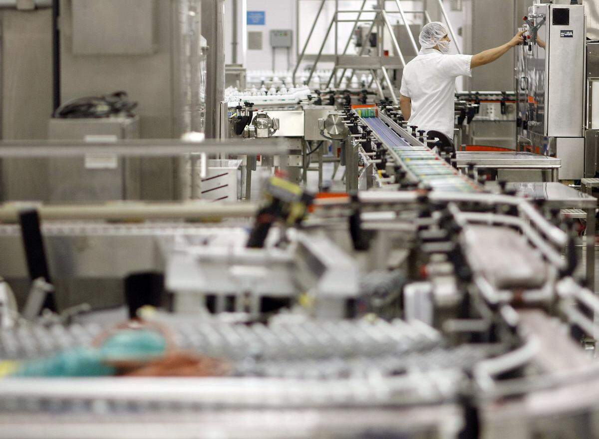 In this 2009 file photo, an Alcon Laboratories employee works on one of its many manufacturing lines at its Fort Worth campus.