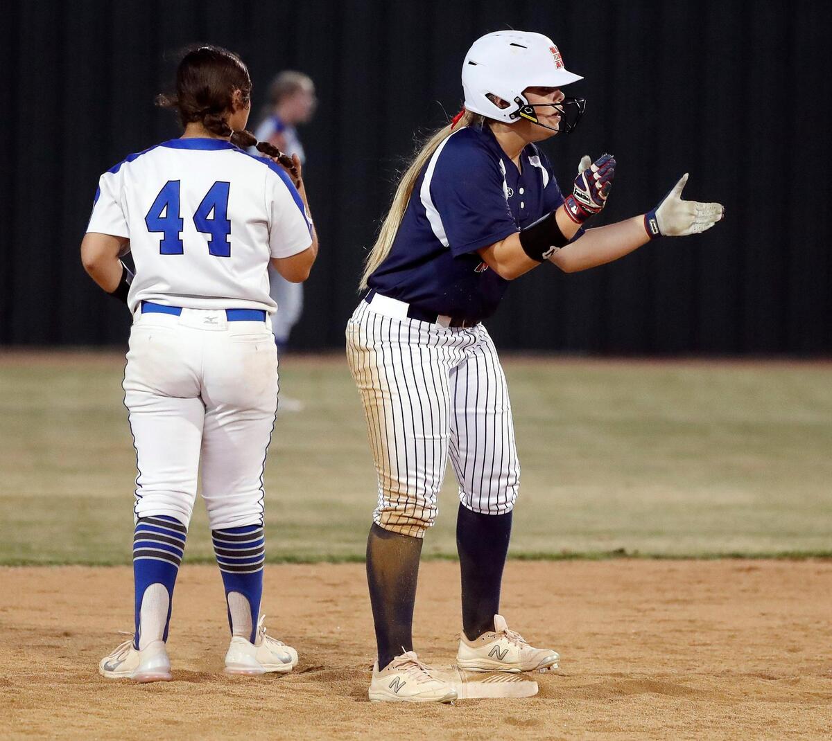Northwest’s Josie Copeland (11) celebrates reaching second during a UIL 5A Region 1 quarter-final playoff softball name at Spartans Softball Field in Mansfield, Texas, Wednesday, May 11, 2022. Centennial defeated Northwest 7-5 in game one. Game two will be at Northwest High School Thursday with game three at Weatherford High School if necessary. (Special to the Star-Telegram Bob Booth)