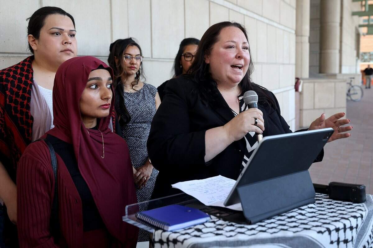Alison Grinter Allen, attorney for defendant Afsheen Khan, left, speaks during a press conference on Monday, Sept. 8, 2025, outside the Tim Curry Criminal Justice Center in Fort Worth. Khan, a pro-Palestine protester, initially faced misdemeanor graffiti charges but prosecutors upgraded her cases to a felony under Texas hate-crime law.