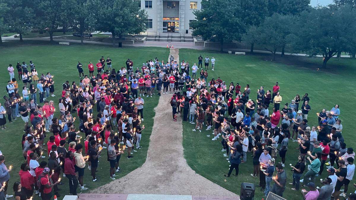 More than 100 people gathered at Texas Wesleyan University on Wednesday for a memorial service honoring Charles Trammell III, who was killed Saturday by a man police said was driving drunk. He was remembered as a selfless person unwavering in his Christian faith.