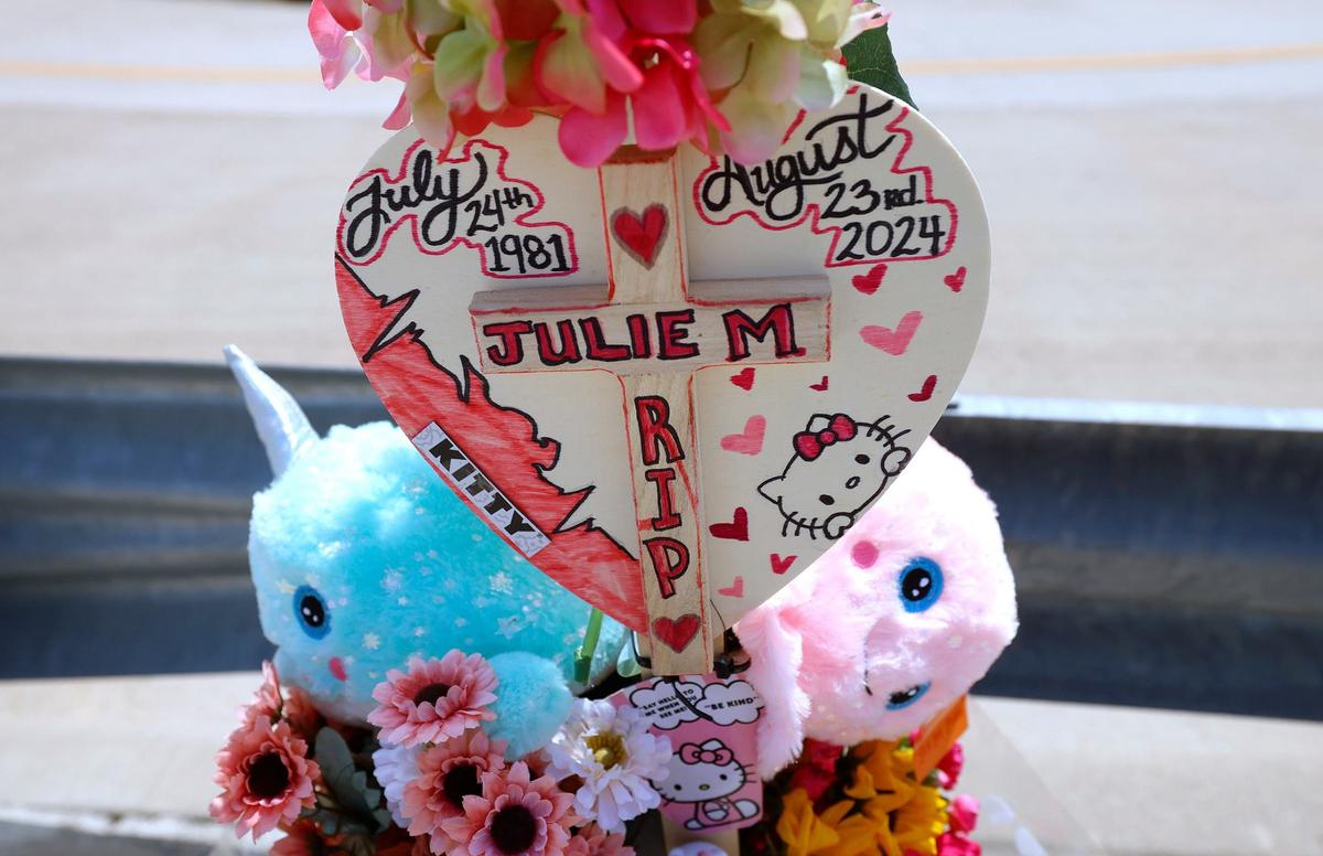 A memorial to Julie Maldonado stands on Webb Lynn Road where it crosses State Highway 360 on Monday, Aug. 26, 2024. Maldonado died after she was hit by a suspected drunk driver late Friday night, Arlington police said.