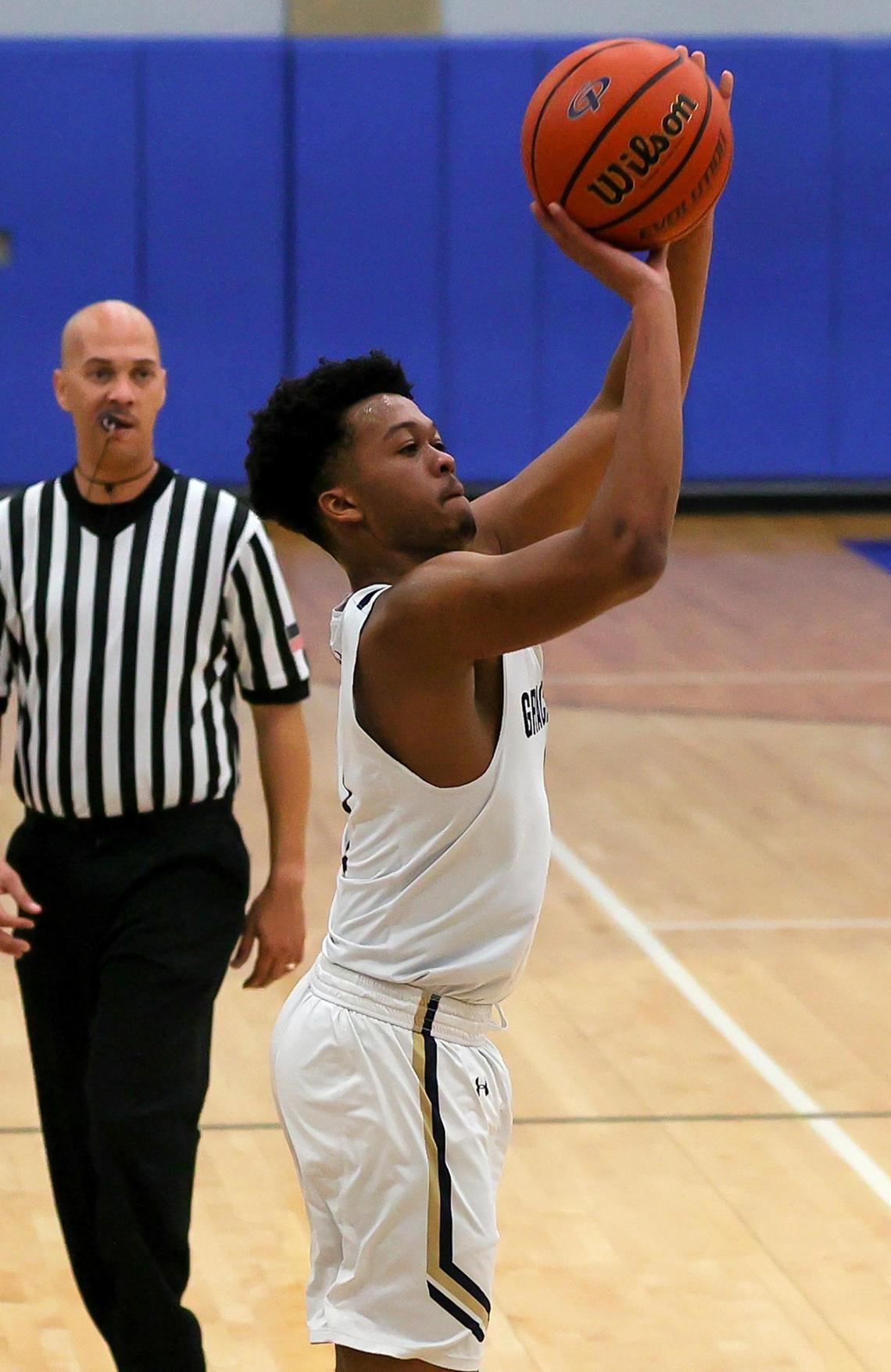 Arlington Grace Prep guard Rob Moreland attempts a three point shot against Colleyville Covenant during the first half of a TAPPS 4A Regional Round Boys Basketball playoff game played on March 6, 2021 at Brewer High School in Fort Worth TX. (Steve Nurenberg Special to the Star-Telegram)
