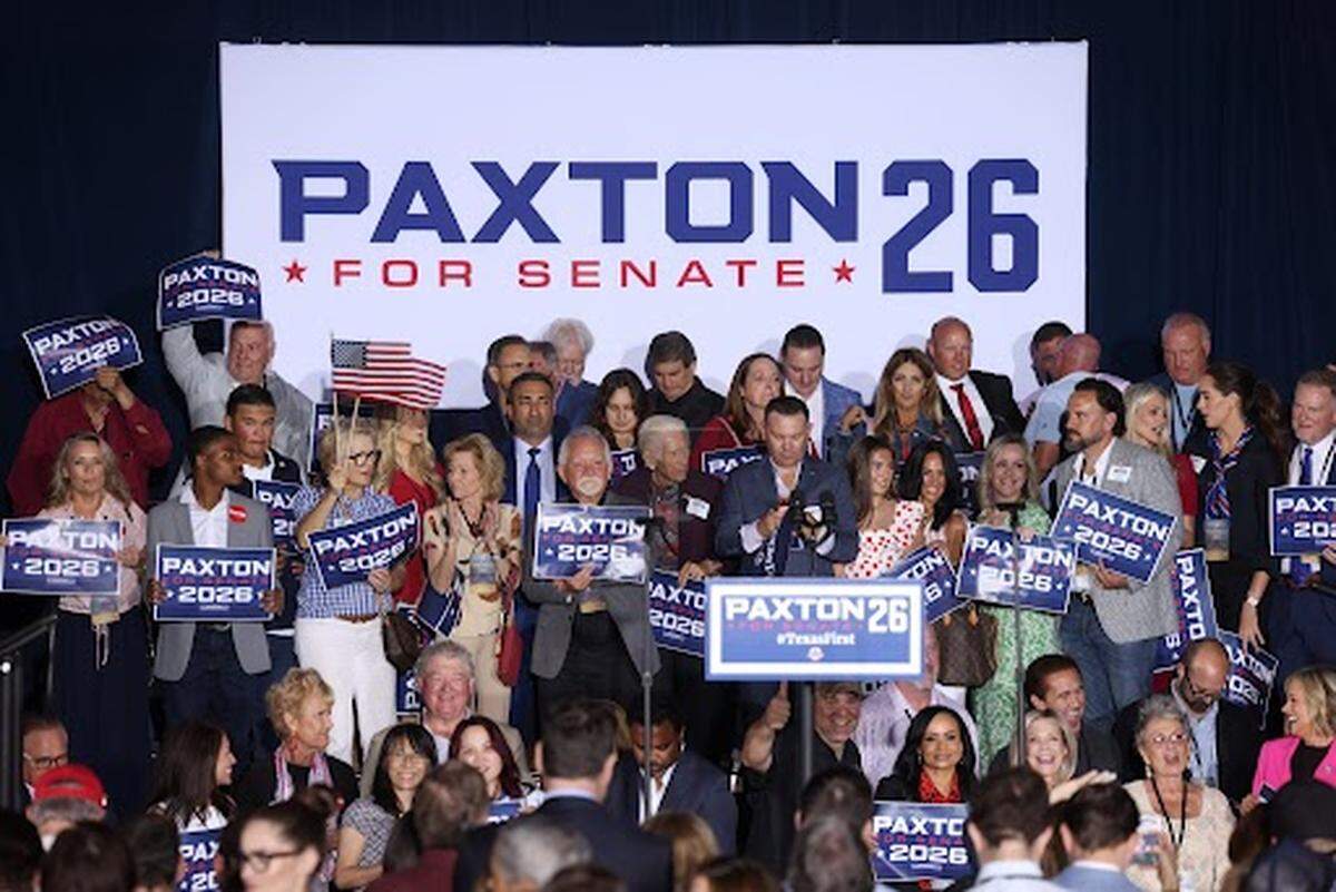 Ken Paxton supporters prepare for speakers to come to the stage at Paxton’s Plano Election Night watch party on May 26 after the U.S. Senate primary runoff is called in his favor at 8 p.m.