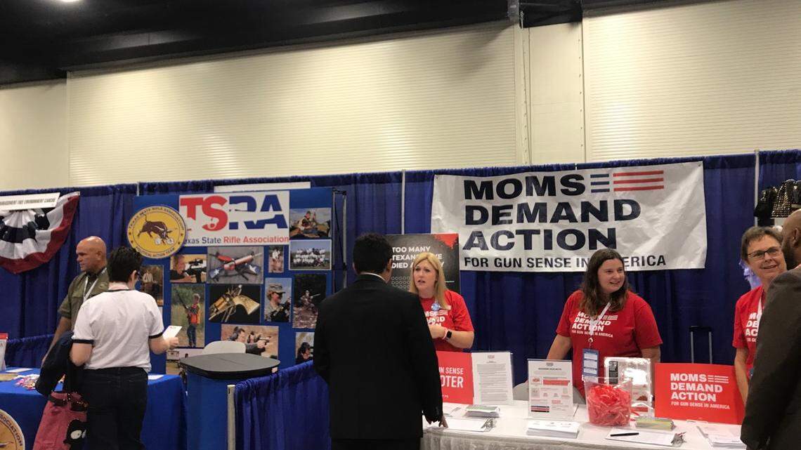 The Moms Demand Action and Texas State Rifle Association booths were side by side at the Texas Democratic Party 2018 state convention in Fort Worth.