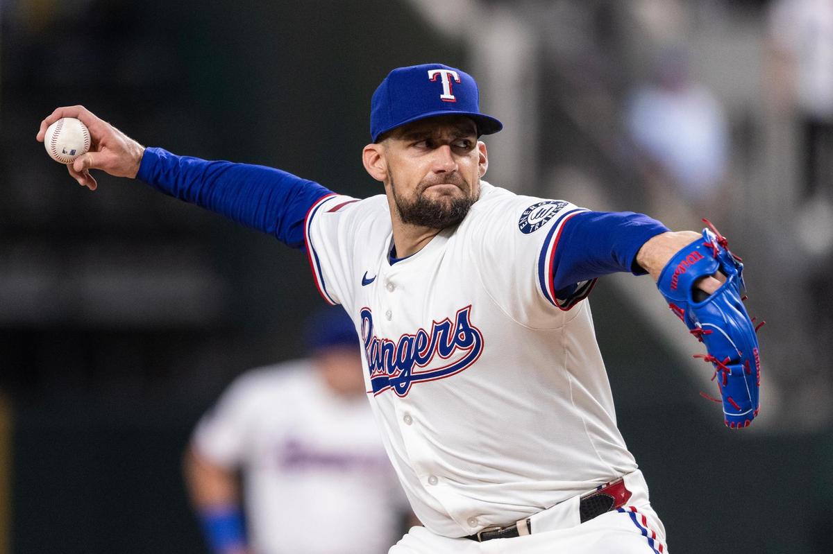 Rangers pitcher Nathan Eovaldi (17) throws a pitch in the first inning of an MLB game between the Rangers and Red Sox at Globe Life Field in Arlington on Thursday, March 27, 2025.