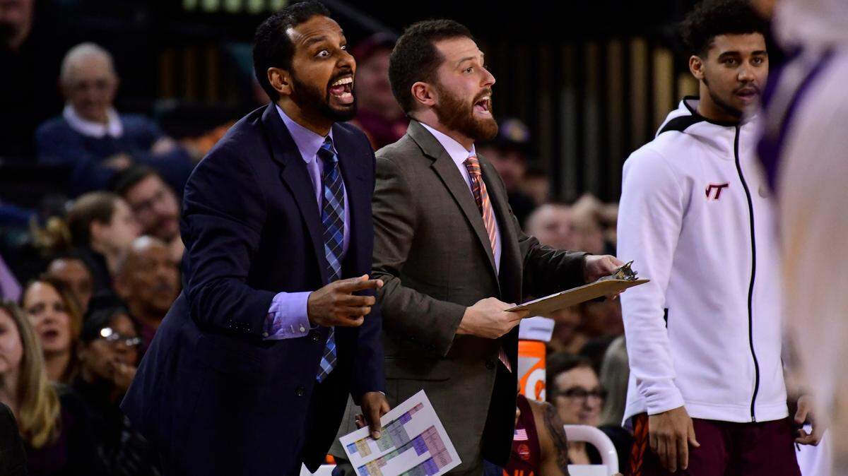 In this file photo, Virginia Tech assistant Jamie McNeilly, left, coaches players during a game in December 2018. McNeilly, who has served as an assistant at Texas A&M the last two seasons, is joining the TCU staff under head coach Jamie Dixon.