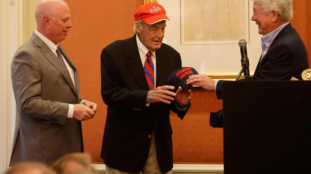 George Young and Edward “Buzz” Kemble, former emcees, are named “Extractor Emeritus” for past fundraising work at the Exchange Club’s annual Christmas fundraiser at the Fort Worth Club in Fort Worth, Texas, Wednesday, Dec. 04, 2024.