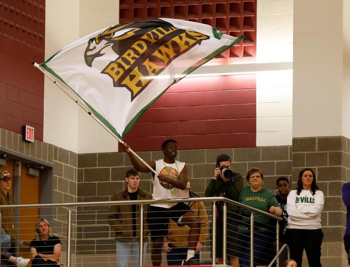 Hawk fans celebrate during the first half of the UIL 5A state semifinal playoff basketball playoff game at Lewisville High School in Lewisville Texas, Tuesday, Mar. 04, 2025.