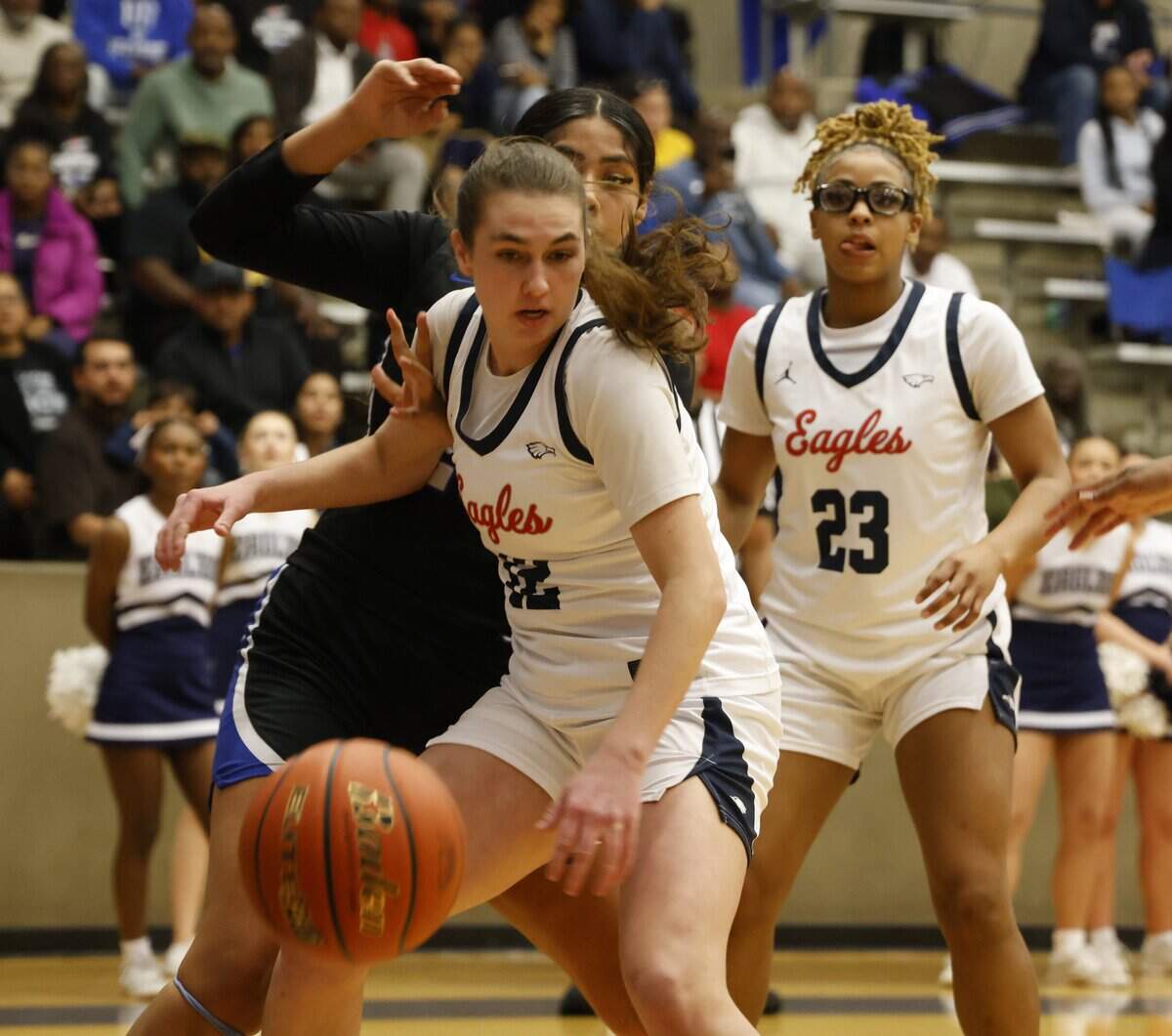 Allen forward Brynn Coleman (12) looses a rebound against Allen during the first half of a UIL Class 6A Division I girls regional semifinals basketball playoff game at Grand Prairie High School in Grand Prairie, Texas, Tuesday Feb. 24, 2026.