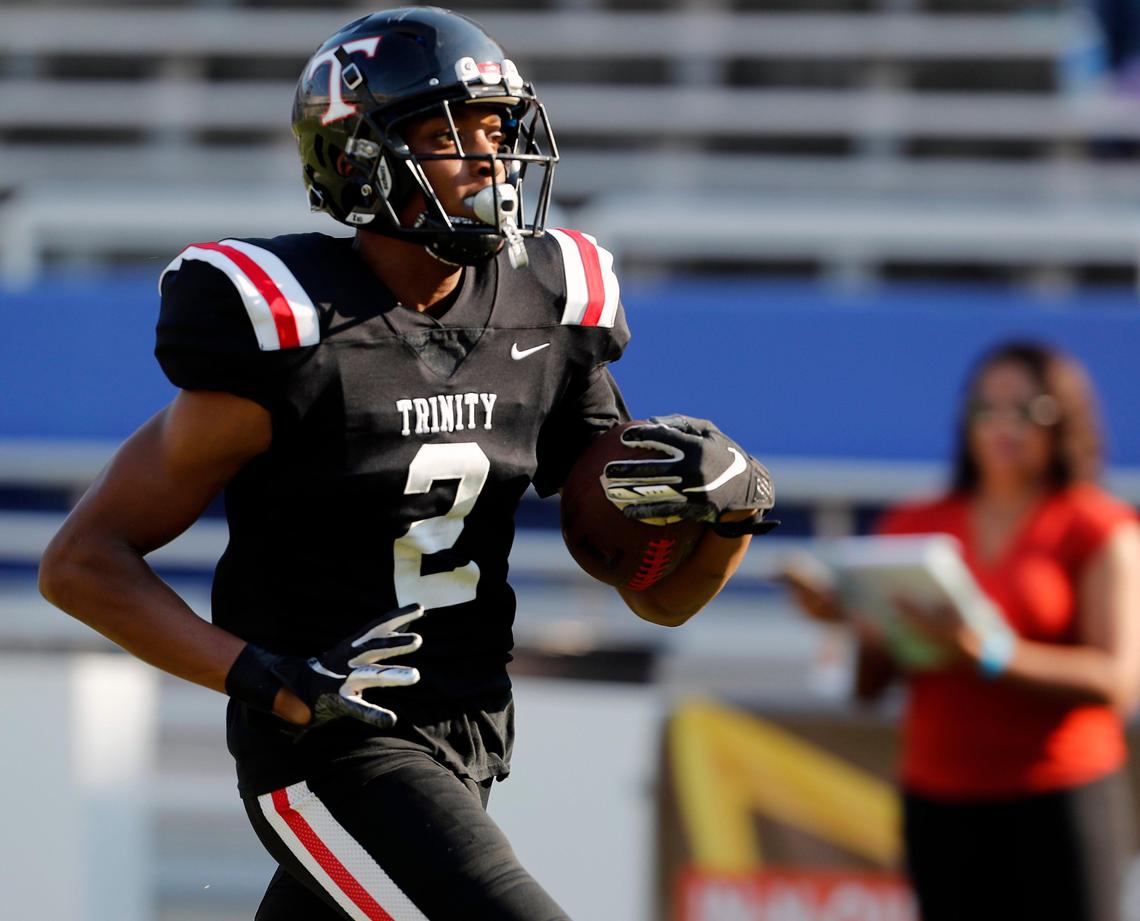 Trinity running back Ollie Gordon (2) sprints in 23 yards for Trinity’s first scoreduring the first half of a high school football game at the Cotton Bowl in Dallas, Texas, Friday, Sept. 06, 2019. Trinity led 14-3 at the half. (Special to the Star-Telegram Bob Booth)