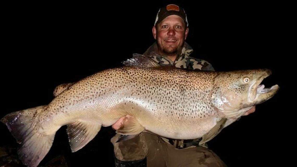 Robbie Dockter of Conrad holds the new Montana state brown trout record.