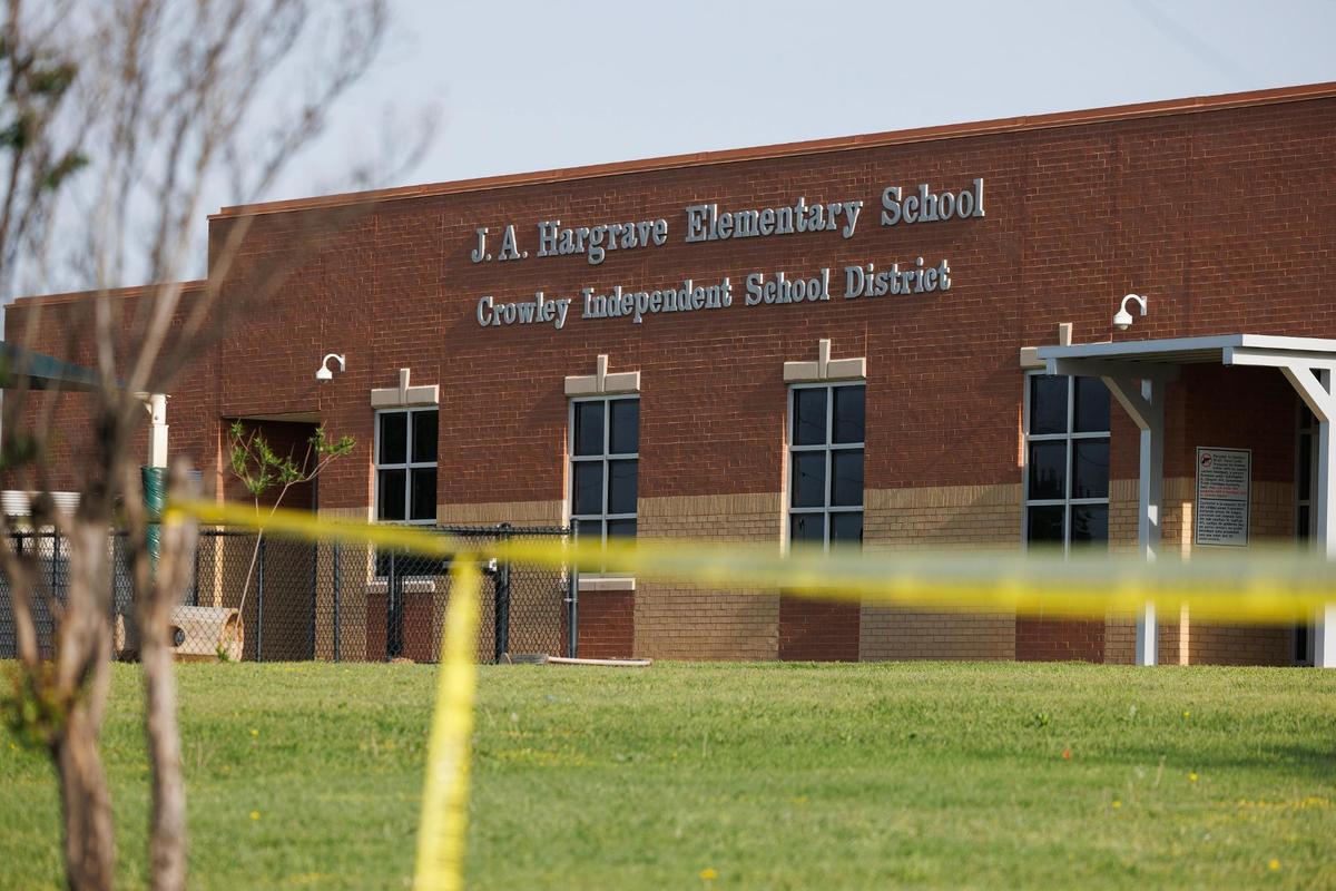 Police tape lines the front of J.A. Hargrave Elementary School, in Tarrant County south of Fort Worth, on Monday, April 14, 2025. Crowley ISD closed the school out of precaution as law enforcement investigated an overnight shooting nearby.