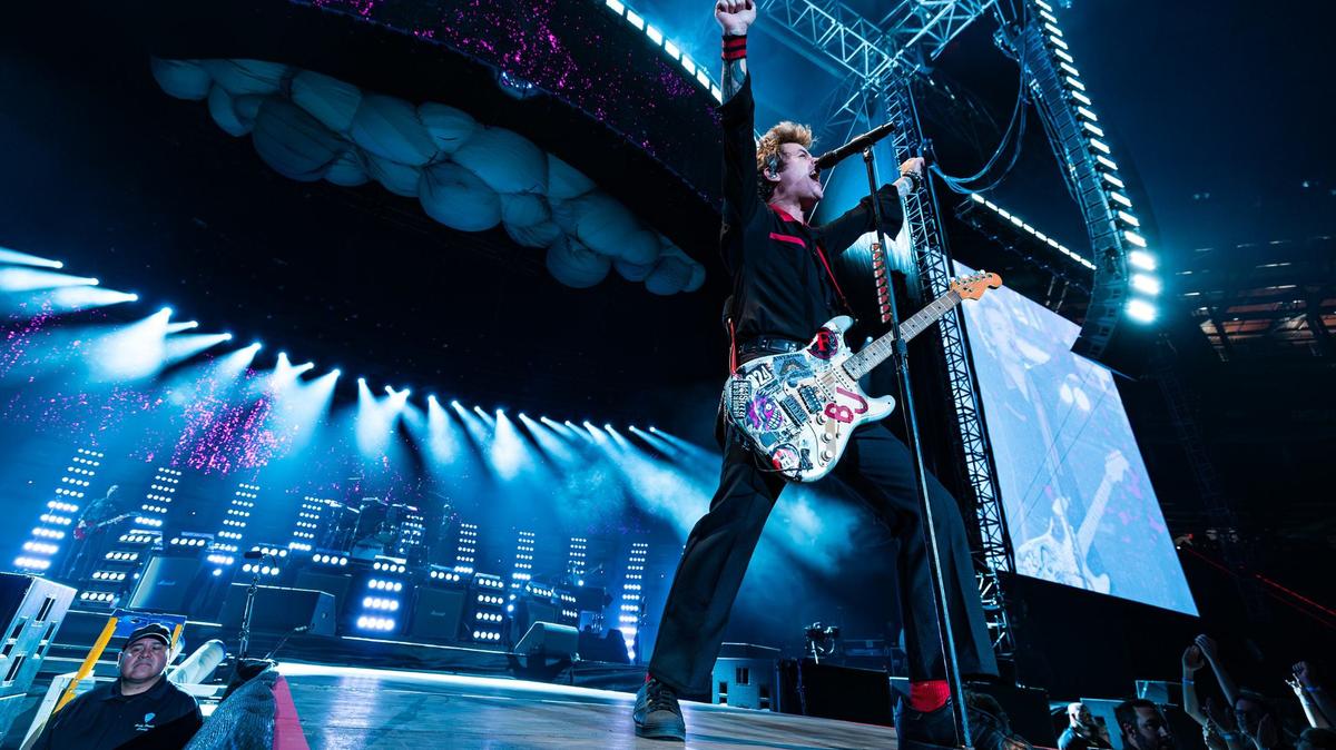 Green Day lead singer Billie Joe Armstrong performs with his band members on stage for “The Saviors Tour” at Globe Life Field in Arlington on Wednesday, Sept. 11, 2024.