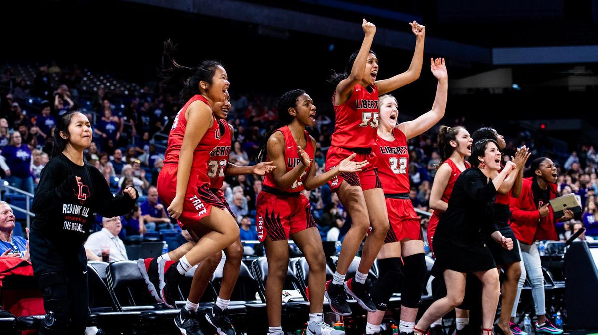 The Redhawks jump in celebration of Maya Jain nailing a three to tie the game with mere seconds remaining in the 4th quarter in their 5A State Semifinal game agaisnt the College Station Cougars at the Alamodome in San Antonio on March 5th, 2020.