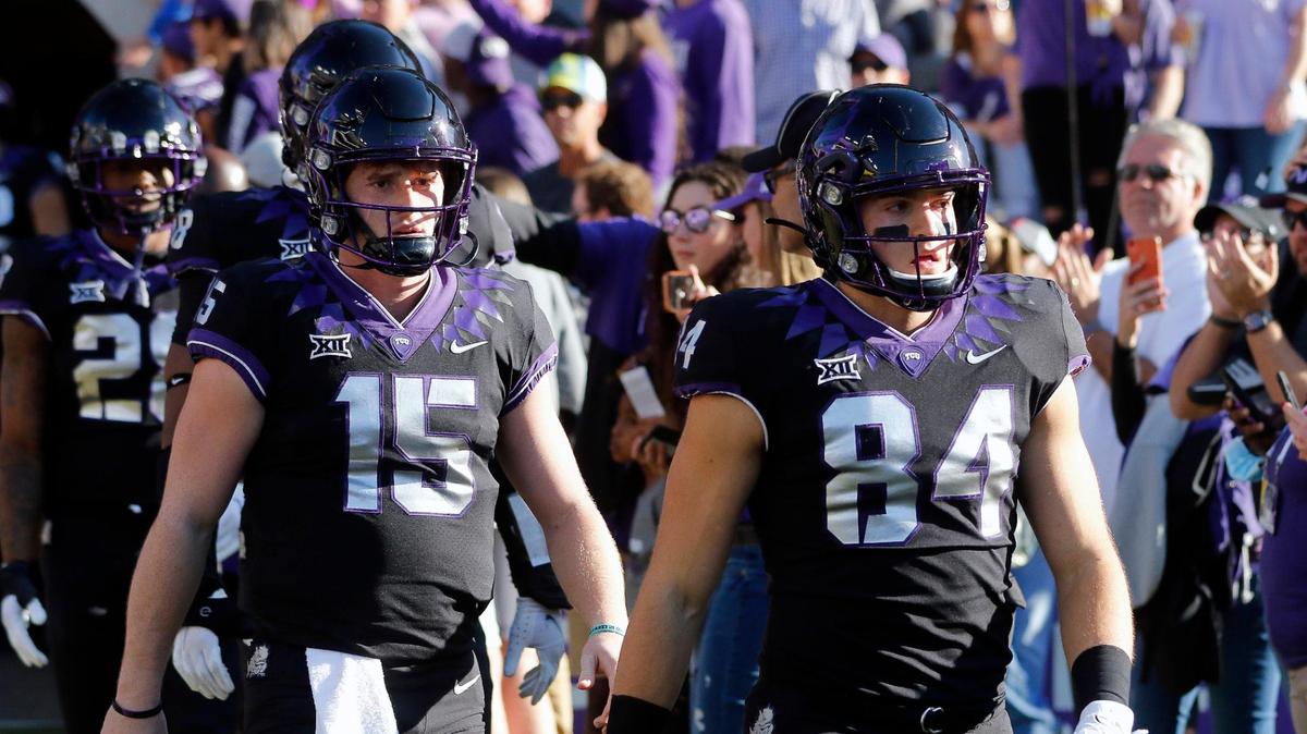 TCU quarterback Max Duggan (15) and tight end Dominic DiNunzio (84) enter the field before a NCAA football game at Amon G. Carter Stadium in Fort Worth, Texas, Saturday Nov. 20, 2021. Kansas led by seven at the half. (Special to the Star-Telegram Bob Booth)