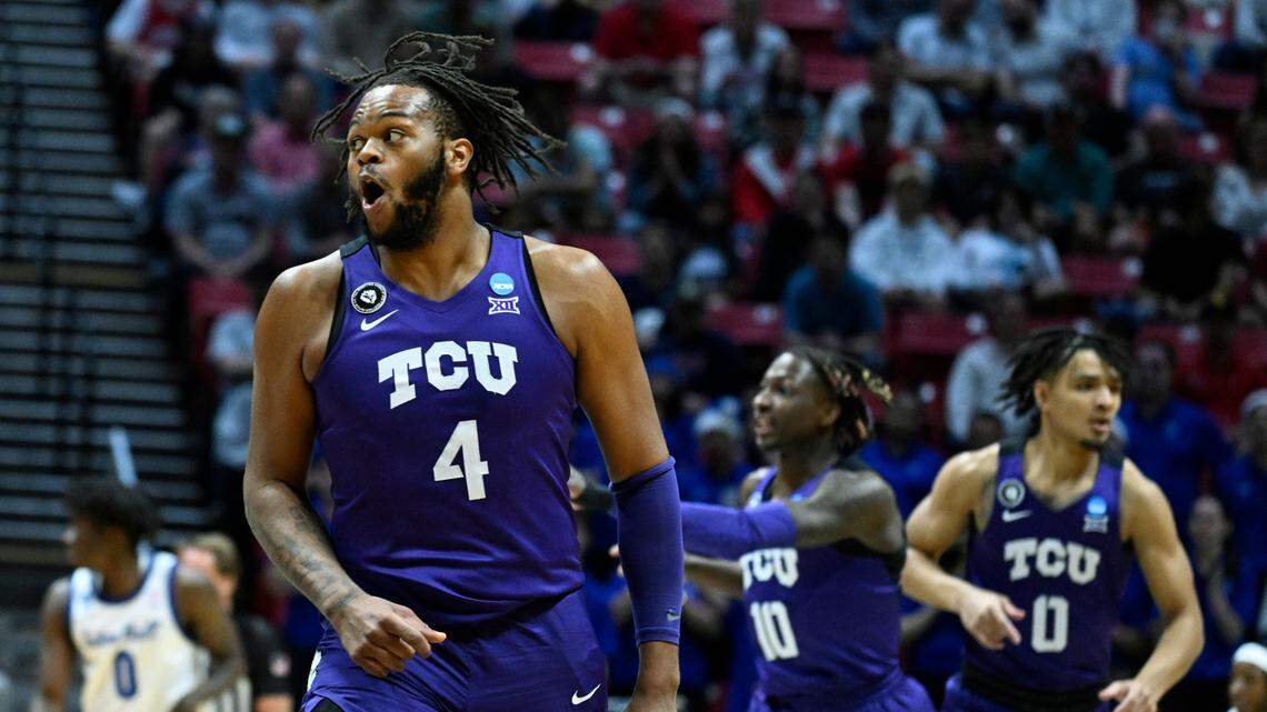 TCU center Eddie Lampkin (4) reacts with teammates during the first half of a first-round NCAA college basketball tournament game against Seton Hall, Friday, March 18, 2022, in San Diego. (AP Photo/Denis Poroy)