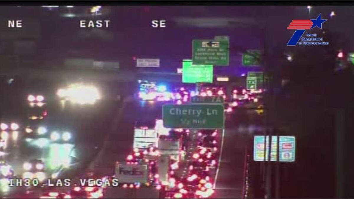 Traffic backed up while the eastbound lanes of Interstate 30 in Fort Worth were shut down at Alta Mere Drive following a wrong-way crash that killed one person and injured three early Thursday morning. All lanes had reopened Thursday afternoon.
