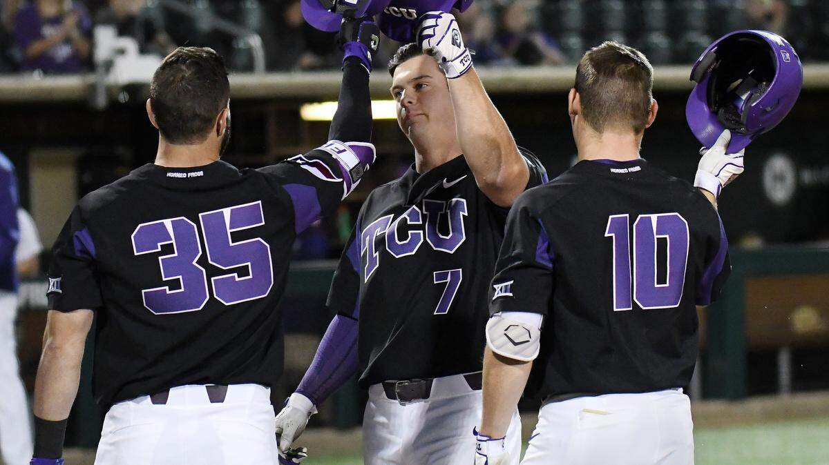 TCU's Josh Watson, center, celebrates with teammates A.J. Balta, left and Zach Humphreys after hitting a three-run home run in the first inning Tuesday. The Horned Frogs beat the University of Texas Rio Grand Valley 7-2.