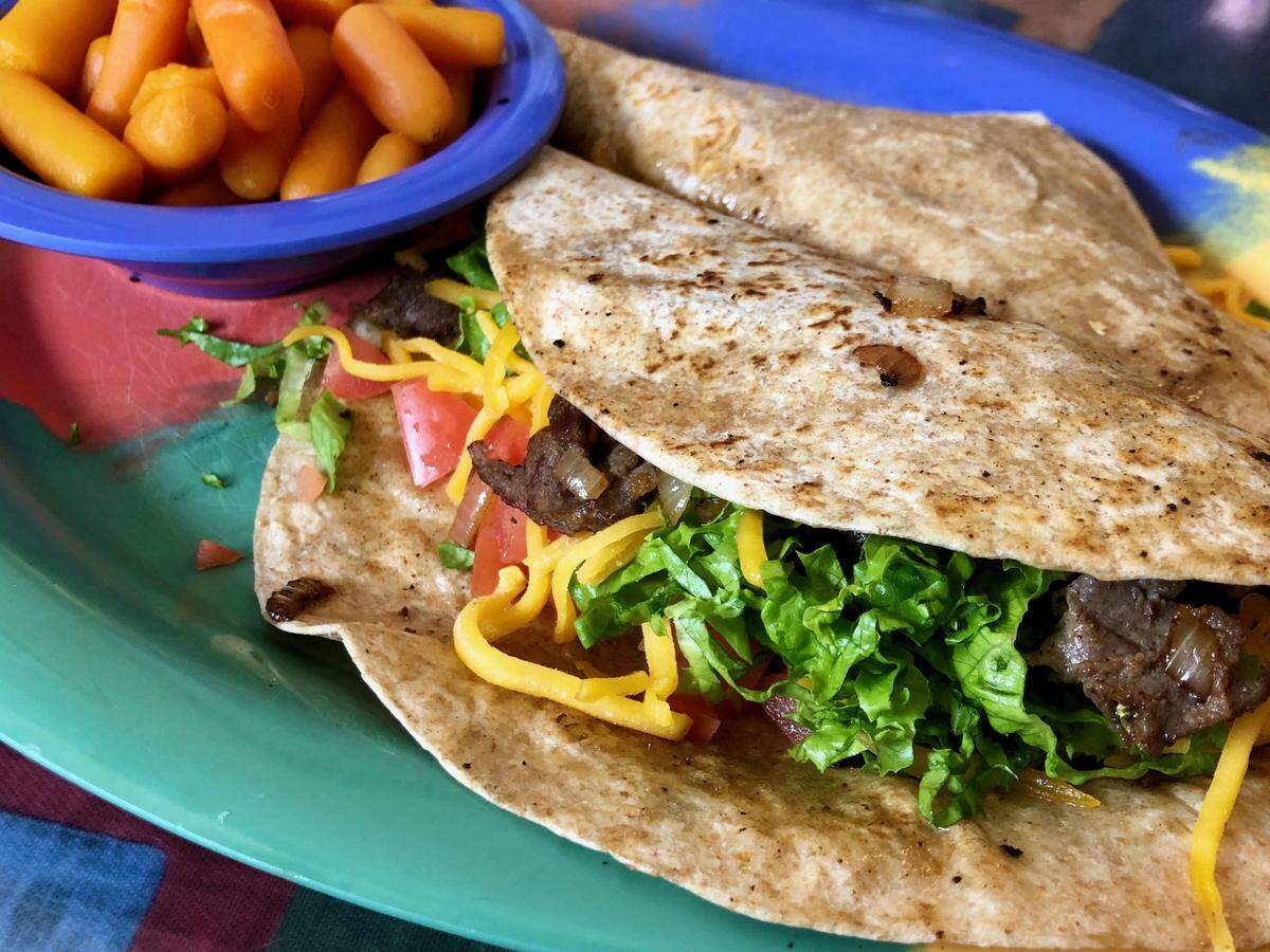 Steak soft tacos on whole-wheat tortillas are new at Old Neighborhood Grill.