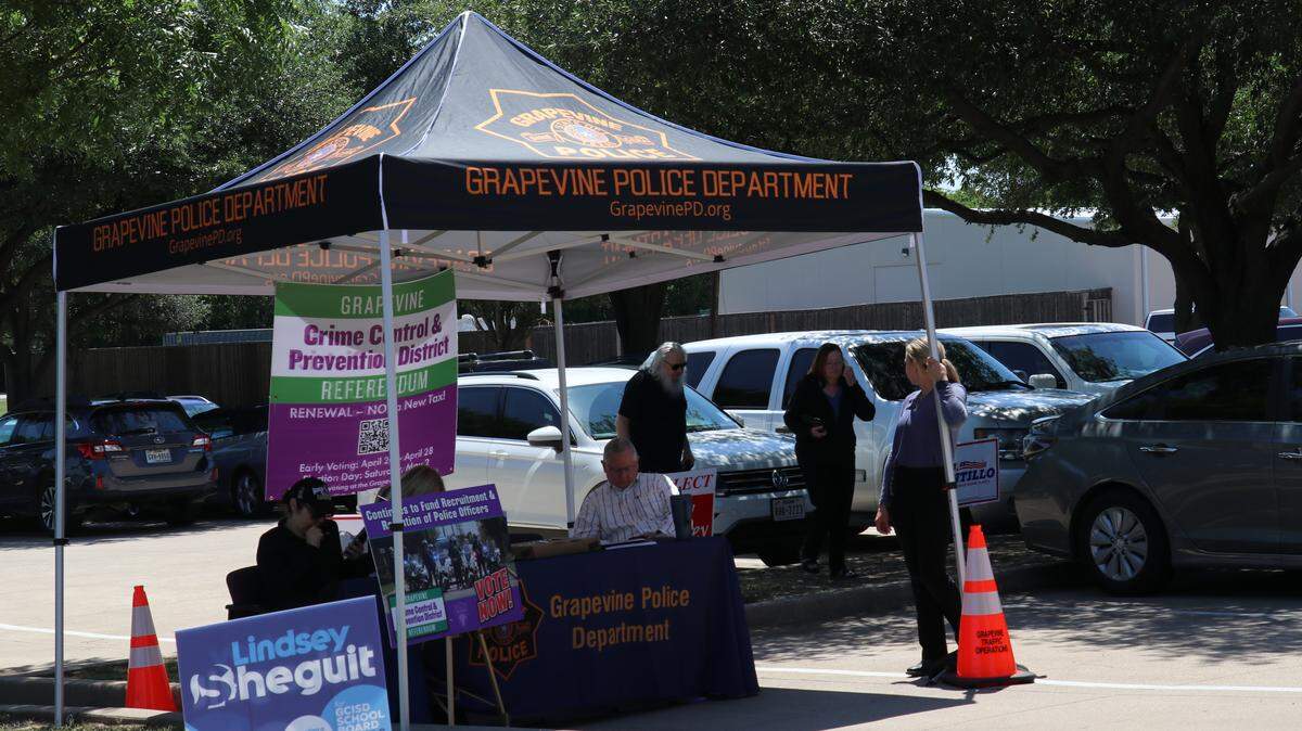 City Staff and Grapevine Police Chief Mike Hamlin outside the Grapevine Public library during voting on May 2.