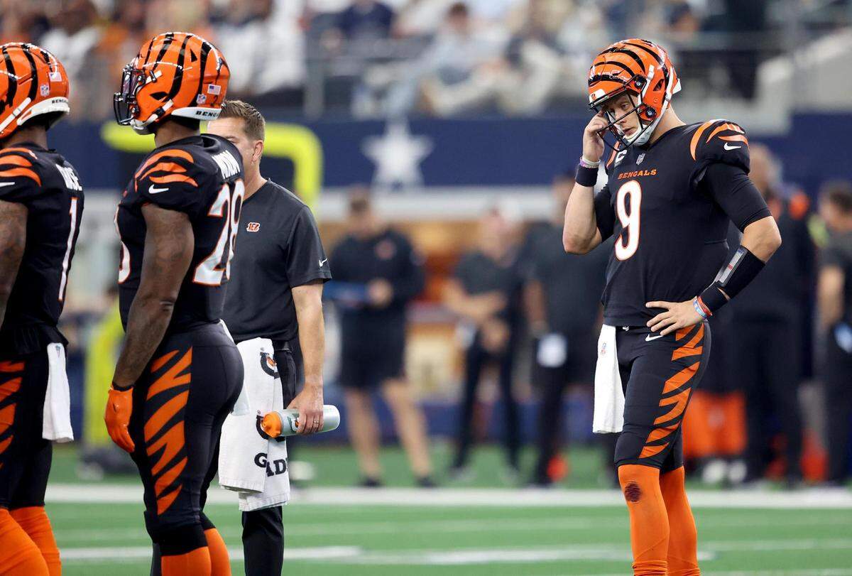 Cincinnati Bengals quarterback Joe Burrow takes a moment between plays on Sunday, September 18, 2022.