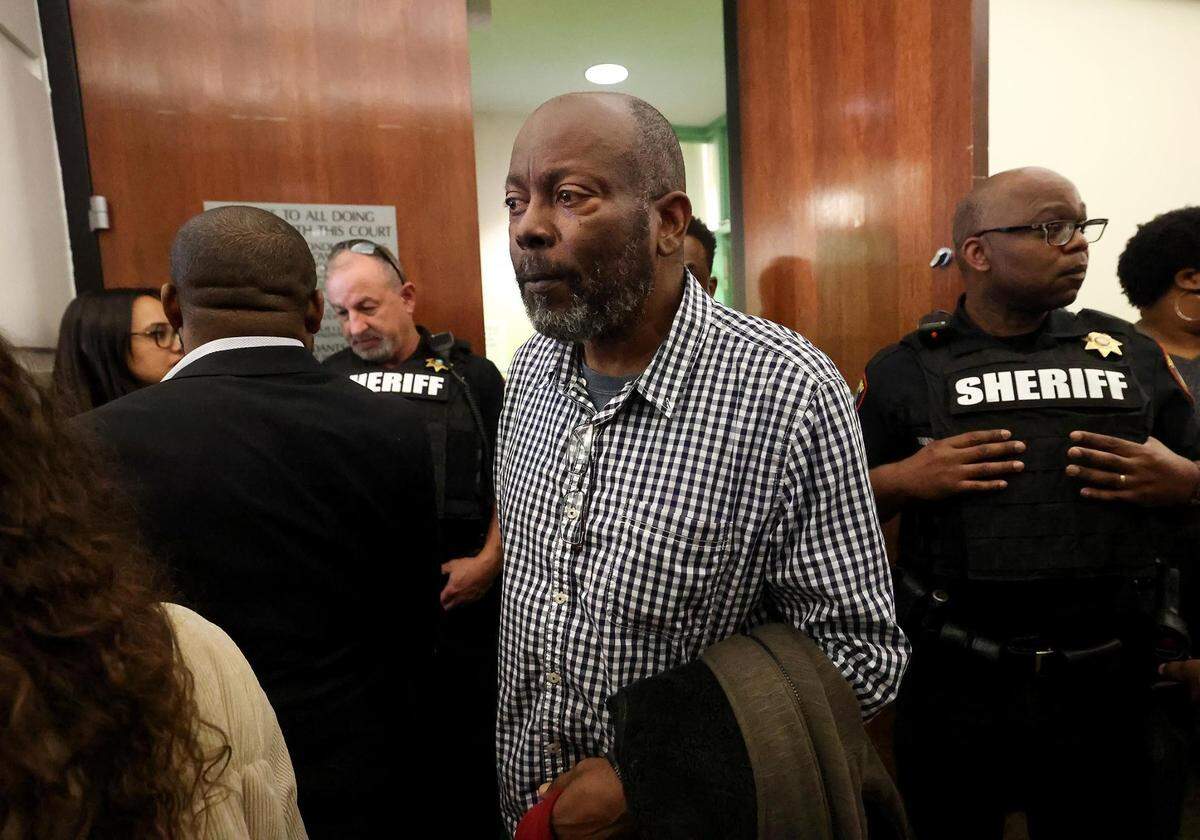 James Smith leaves the courtroom after Aaron Dean was found guilty of manslaughter in the shooting death of Atatiana Jefferson by a jury on Thursday, Dec. 15, 2022, at the Tim Curry Criminal Justice Center in Fort Worth.