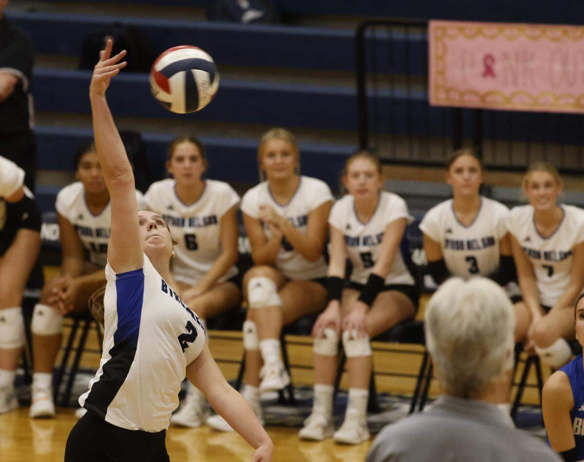 Byron Nelson senior outside hitter Kylie Kleckner hits the ball over the net against Keller on Oct. 14.