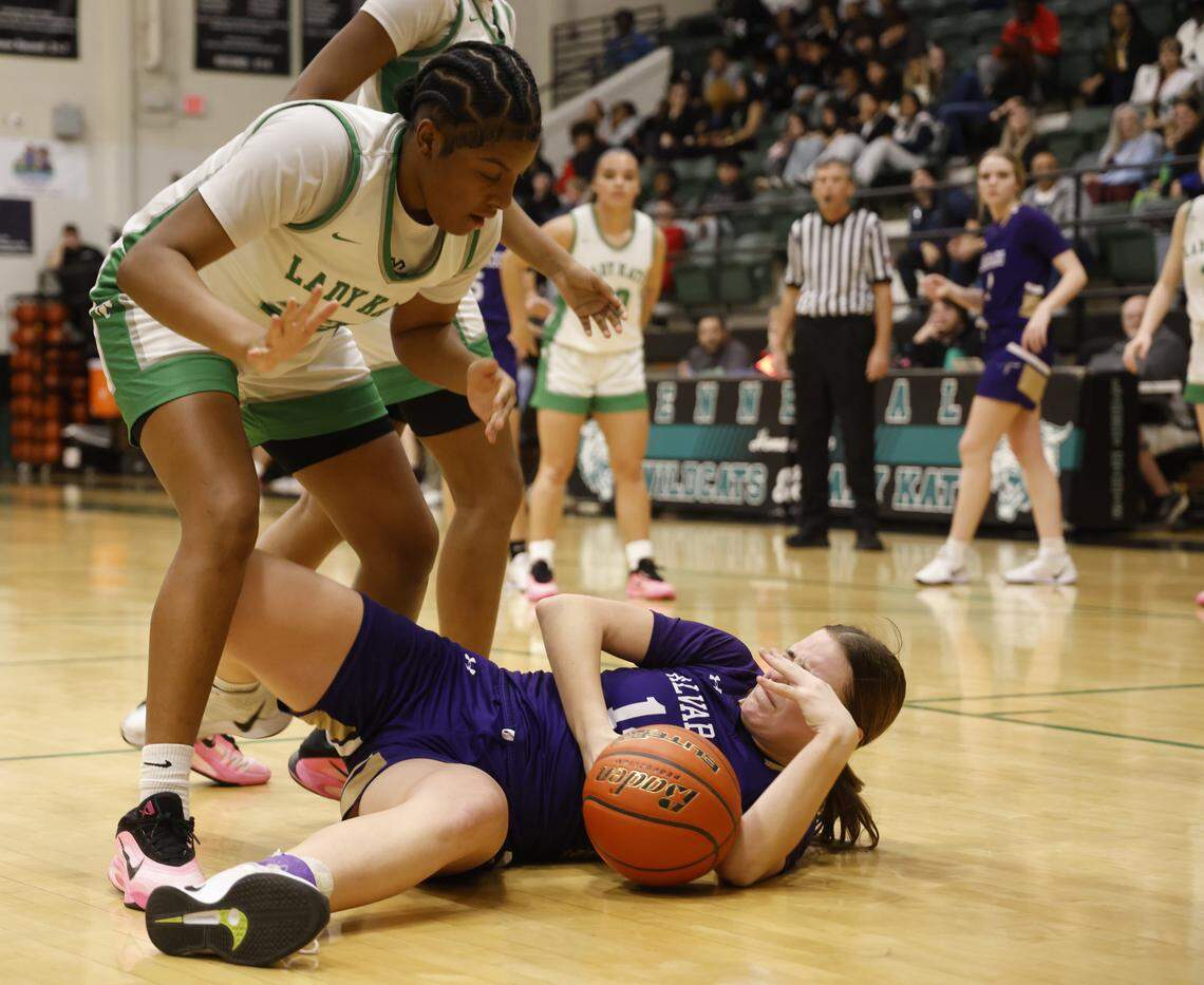 Alvarado center McKayla Norris (14) hits the wood under Kennedale forward Ciara Taylor (23) during the second half of a UIL girls basketball game between Alvarado and Kennedale at Kennedale High School in Kennedale, Texas, Tuesday Jan. 13, 2026