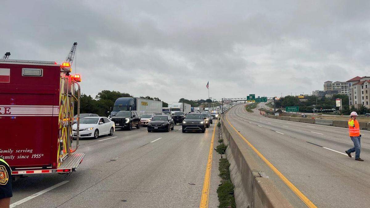 A crash involving a motorcycle and a car shut down traffic on Interstate 30 in both directions between Dalrock and Horizon roads near Rowlett and Rockwall on Sunday morning, police said. The motorcyclist was hospitalized in critical condition, and two people who were in the car were arrested.