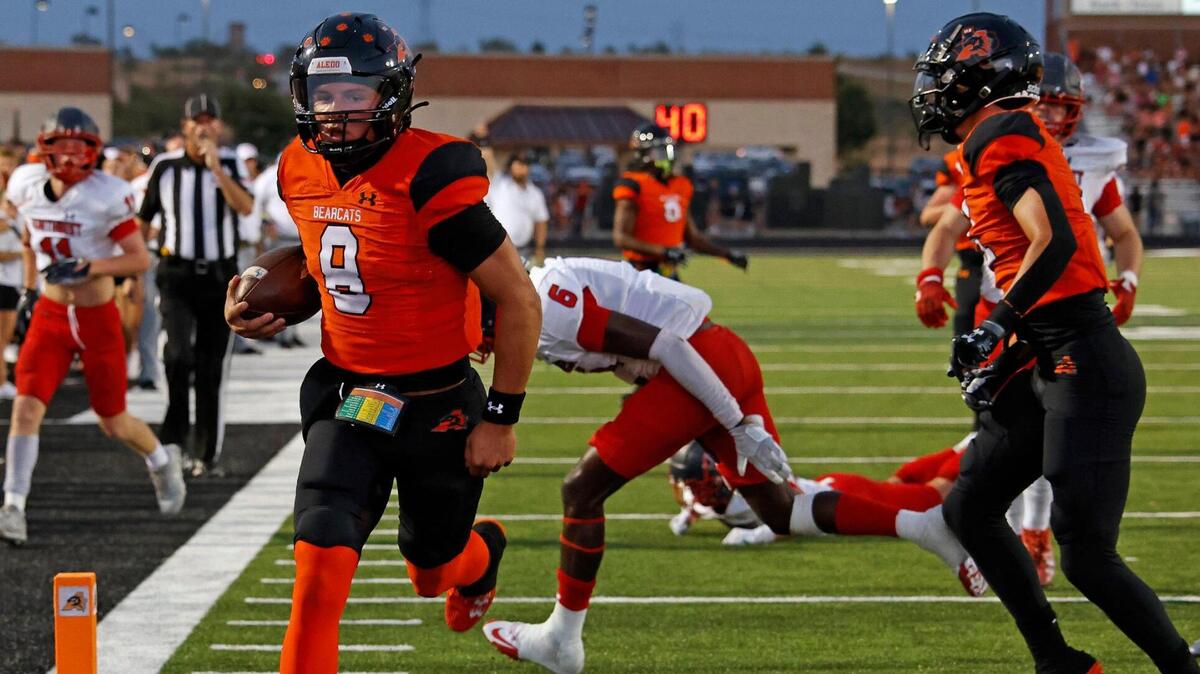 Aledo quarterback Hauss Hejny (8) takes the ball in for six in the first half of a UIL football game at Buchanan Stadium in Aledo, Texas, Friday Sept. 08, 2023. Aledo led 17-6 at the half.