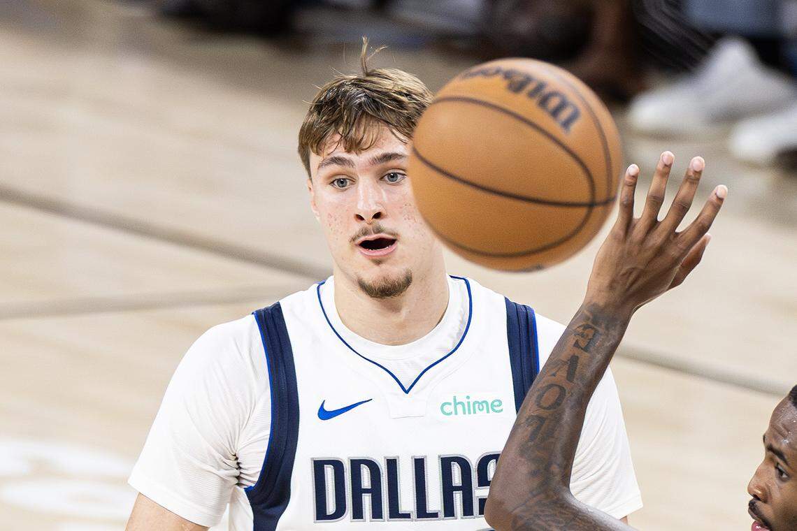 Mavericks forward Cooper Flagg passes the ball in the first half of a preseason NBA game between the Dallas Mavericks and Oklahoma City Thunder at Dickies Arena in Fort Worth on Monday, Oct. 6, 2025.