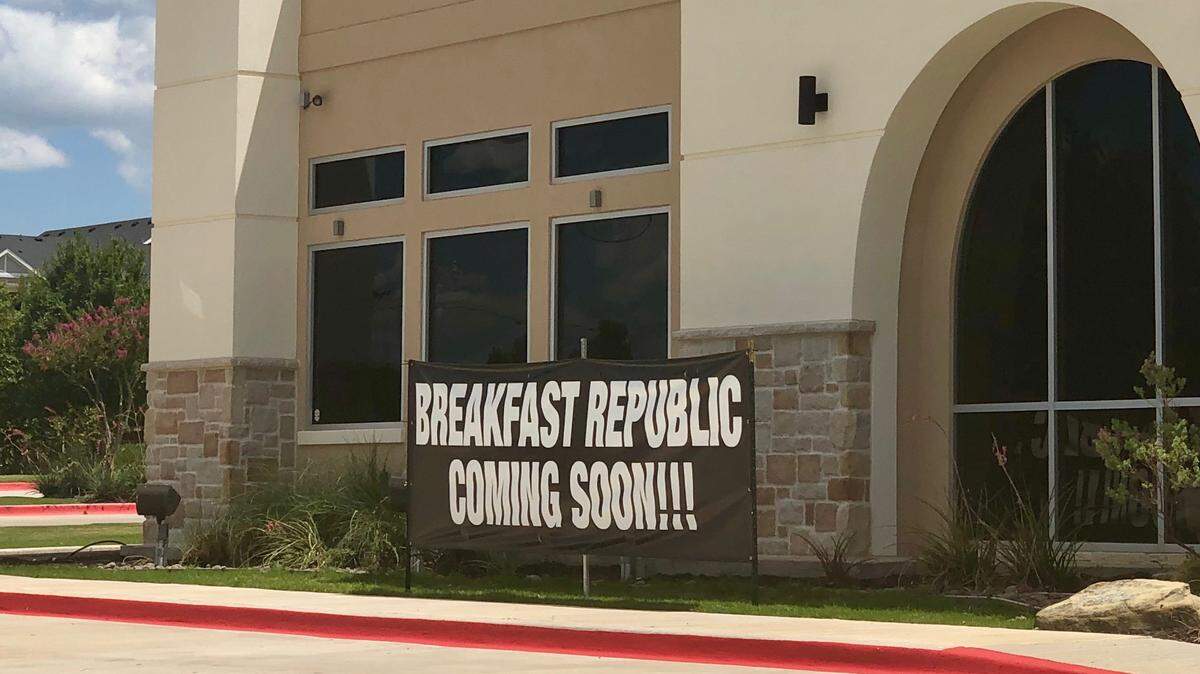 A sign on a North Beach Street restaurant advertised a Breakfast Republic opening, but the California chain by the same name objected.