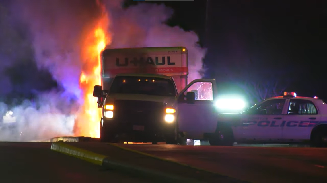 The driver of a stolen U-Haul truck crashed into a car, shot at the person inside, then led Houston police on a chase before catching fire.