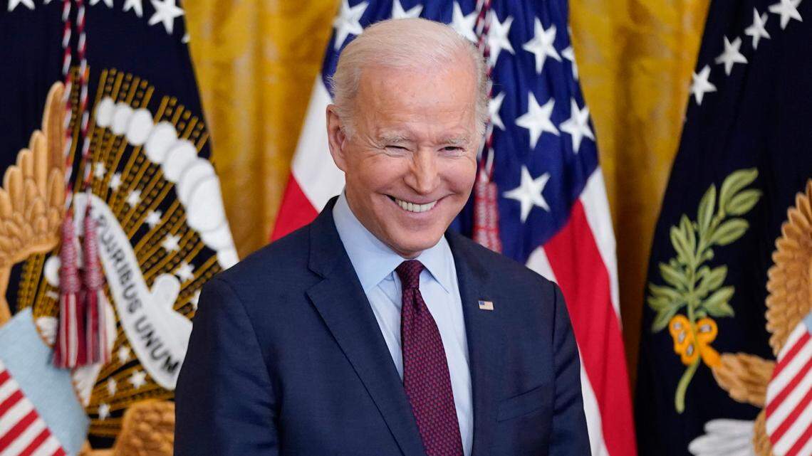 President Joe Biden waits to speak and sign a bill to end forced arbitration in sexual harassment cases in the workplace, Thursday, March 3, 2022, in the East Room of the White House in Washington. (AP Photo/Patrick Semansky)