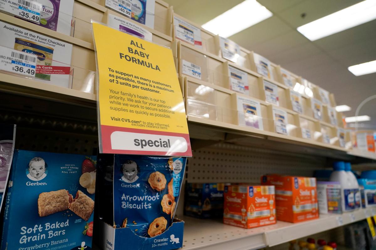 A sign is posted at a CVS pharmacy indicating a shortage in the availability of baby food Tuesday, May 10, 2022, in Charlotte, N.C. Parents in much of the U.S. are scrambling to find baby formula after a combination of supply disruptions and safety recalls have swept many of the leading brands from store shelves. (AP Photo/Chris Carlson)