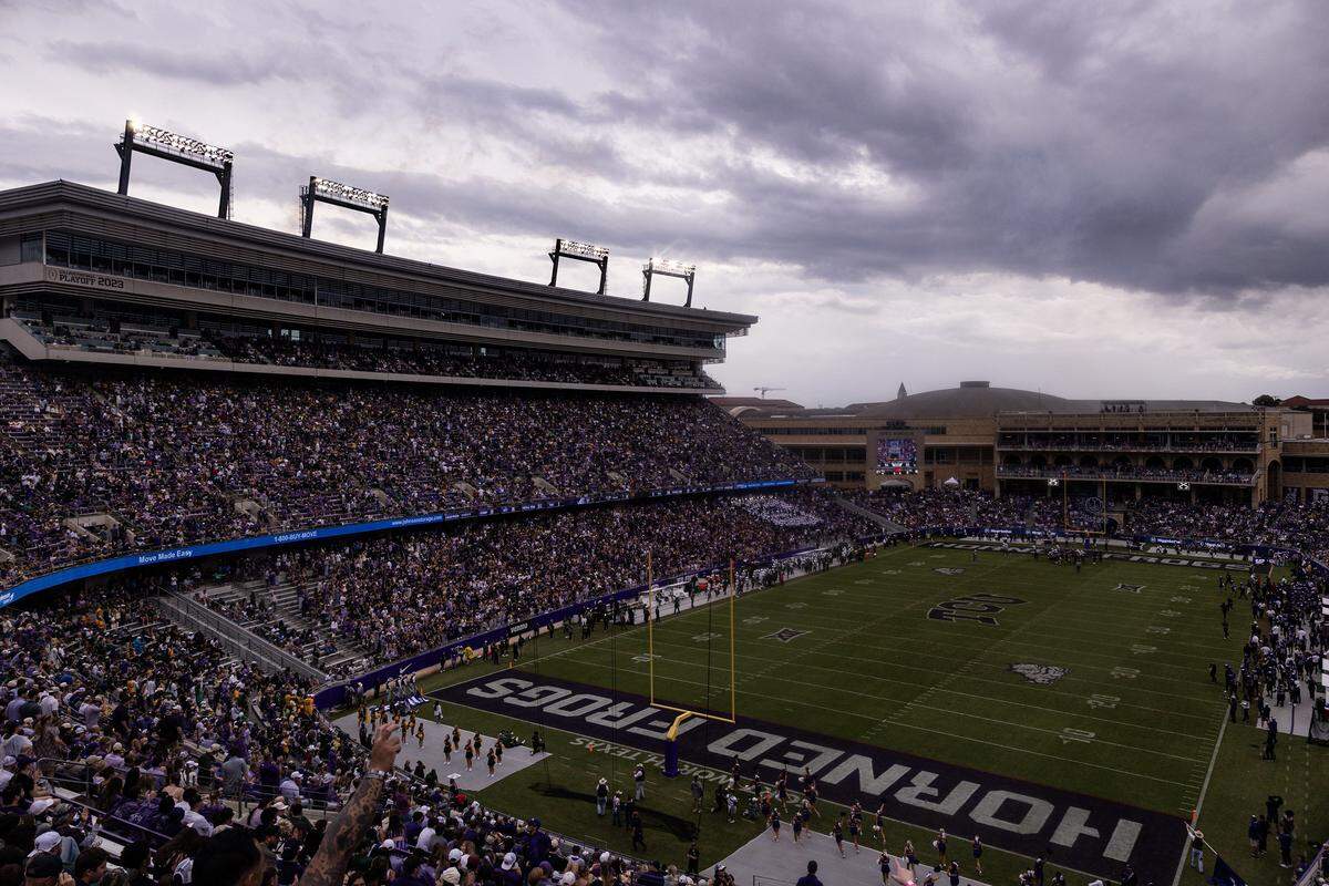 Storm clouds begin to set in prior to a weather delay in the second half of a Big XII football game between the TCU Horned Frogs and the Baylor Bears at Amon G Carter Stadium in Fort Worth on Saturday, Oct. 18, 2025.
