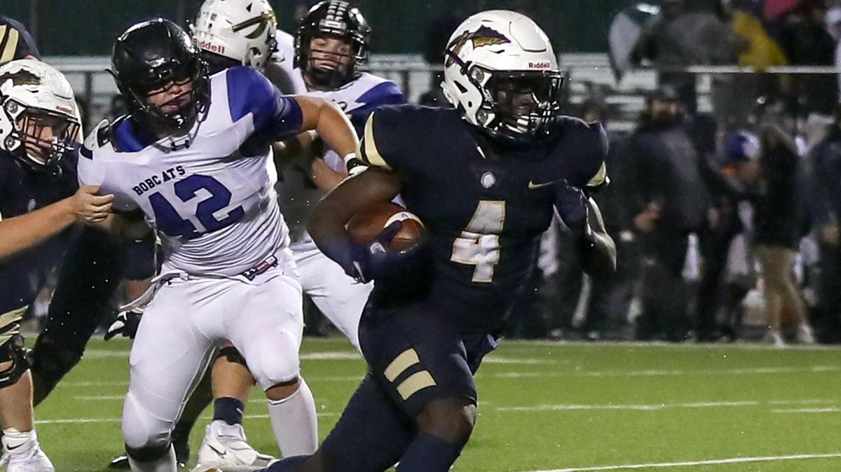 Keller running back Enoch Ntchobo (4) goes 23 yards for a touchdown against Byron Nelson during the first haif, Thursday night, October 24, 2019 played at Keller ISD Stadium in Keller, TX.